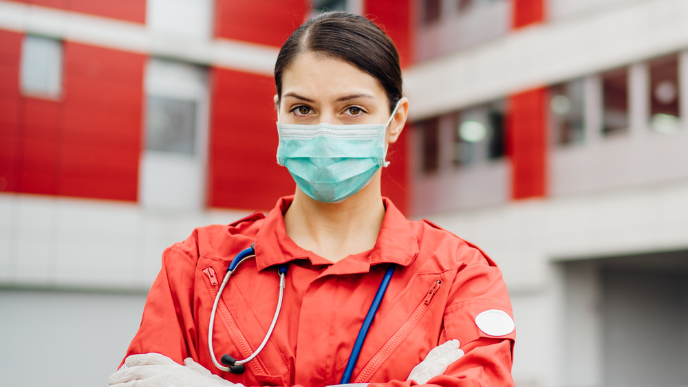 Paramedic outside a hospital