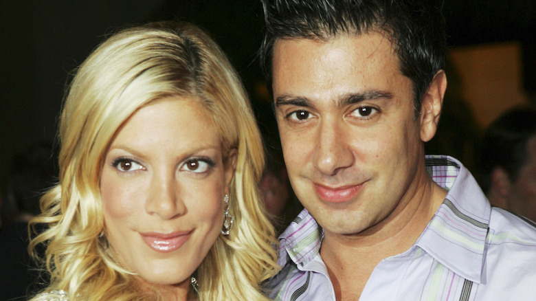 Tori Spelling and Charlie Shahnaian smiling