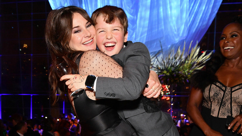 Iain Armitage and Shailene Woodley smiling and hugging