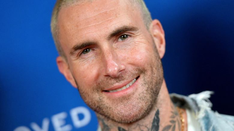 Adam Levine with short blond hair