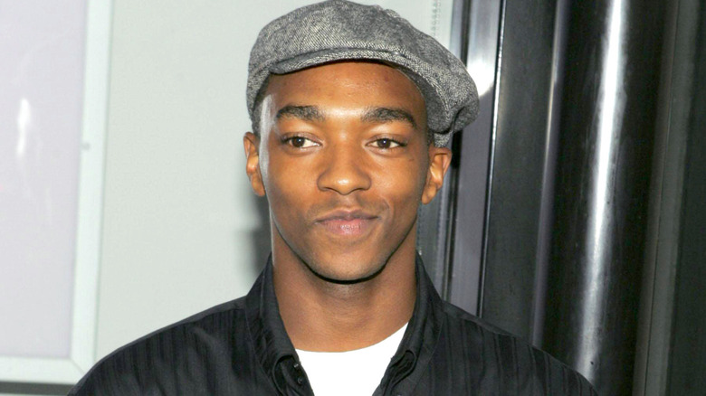 Young Anthony Mackie wearing cap