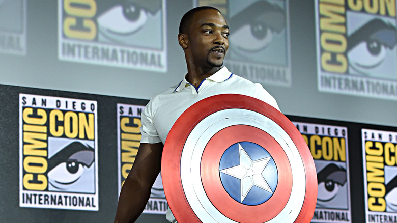 Anthony Mackie holding Captain America shield