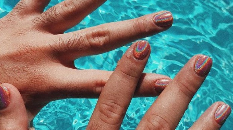 Bad Bunny showing off manicure