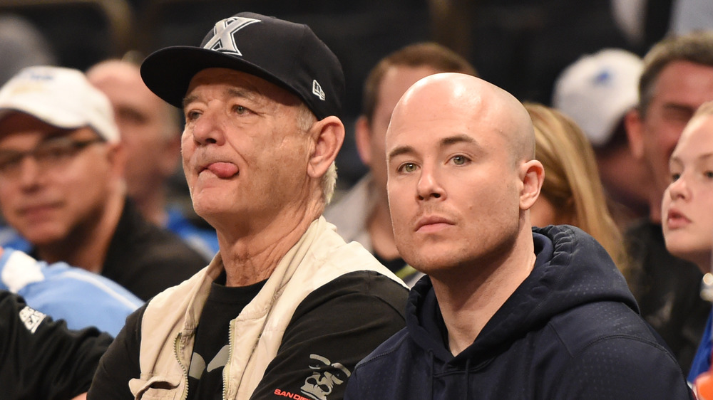 Murray attends a basketball game with his son Luke
