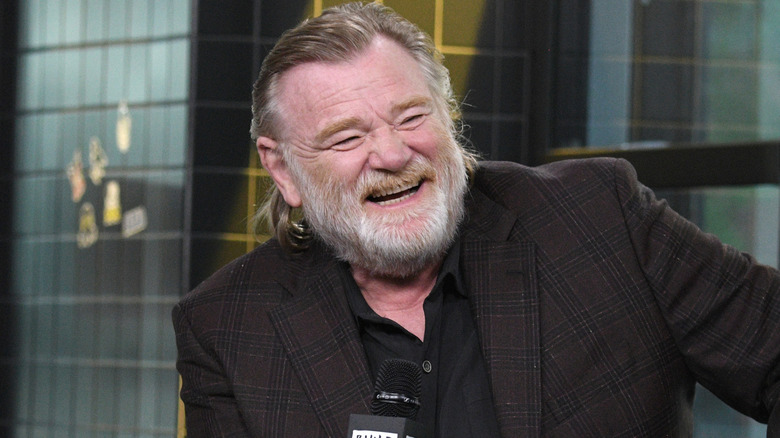Brendan Gleeson laughing