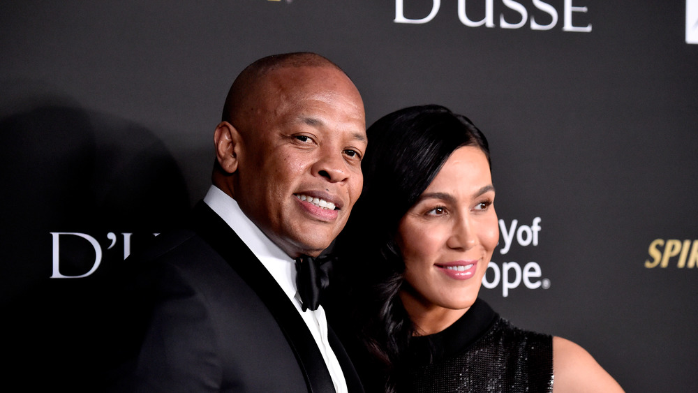 Dr. Dre and Nicole Young on red carpet