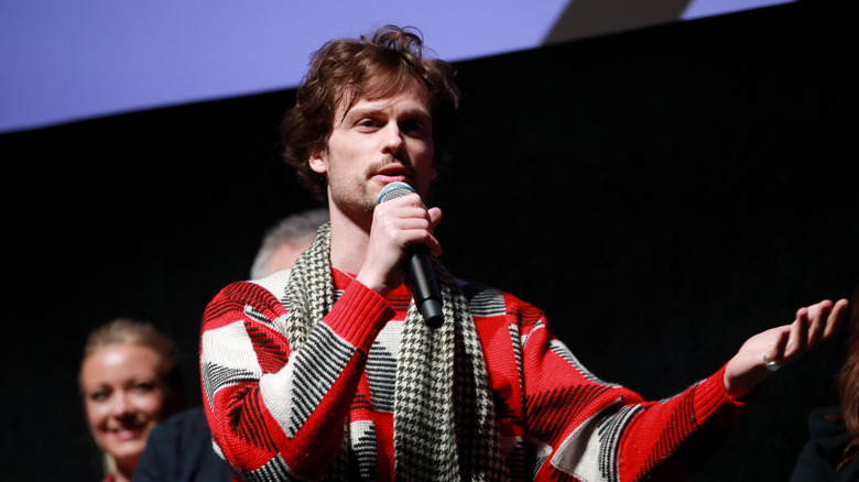 Matthew Gray Gubler speaking on stage