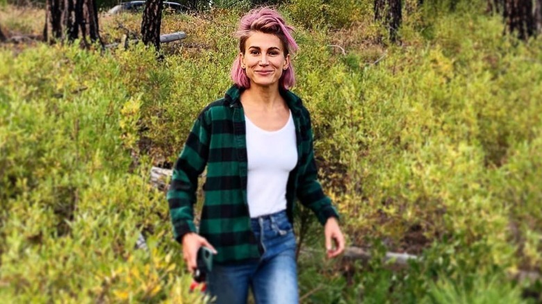 Jennifer Landon smiling in a field