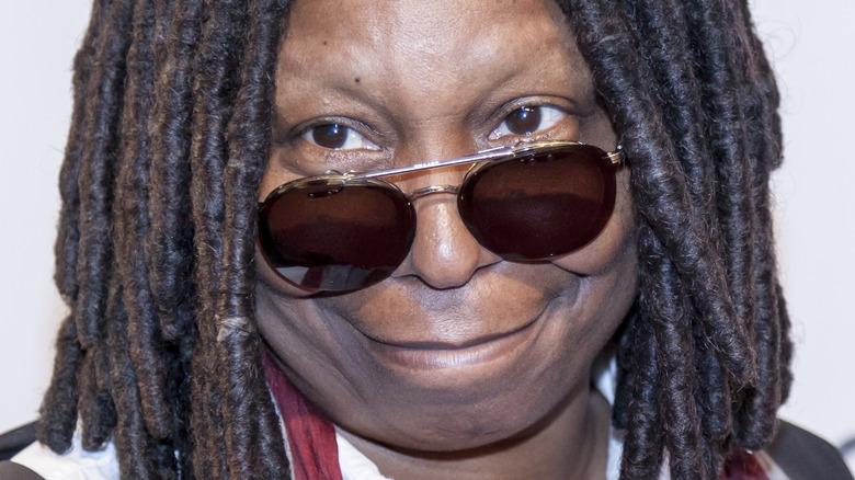 Close up of Whoopi Goldberg wearing sunglasses