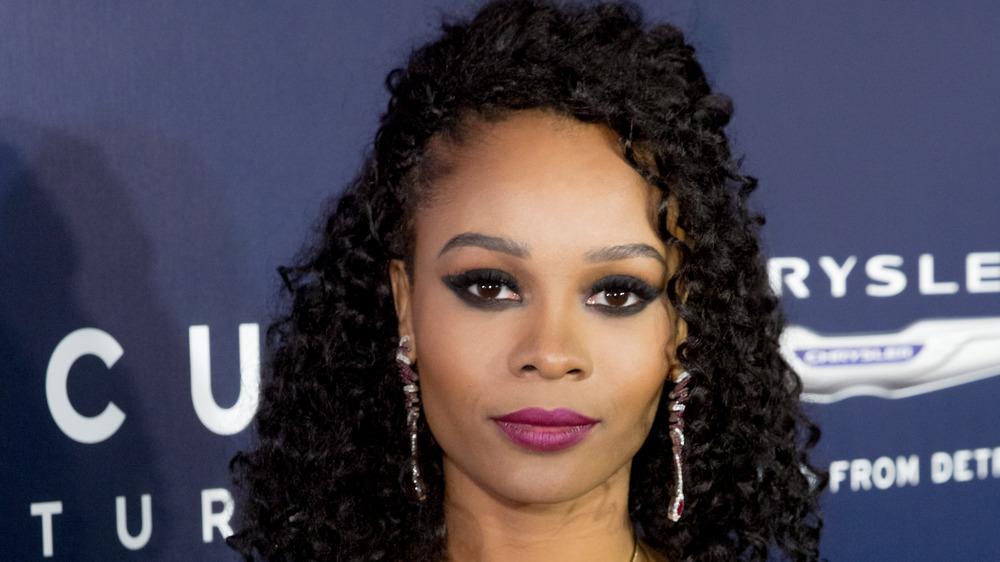 Zuri Hall, pink lipstick 