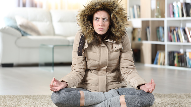 Doing yoga in a parka