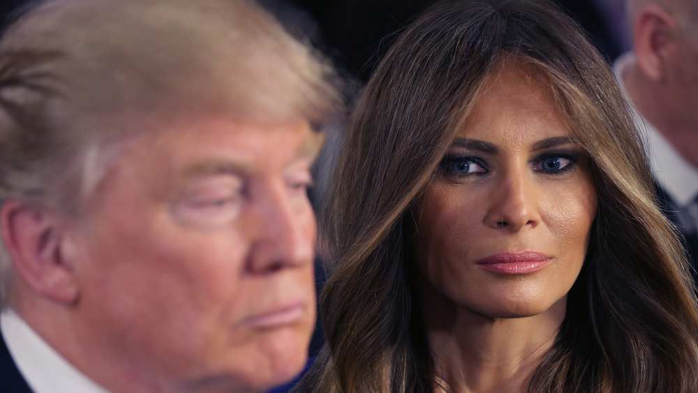 Melania Trump regards Donald Trump