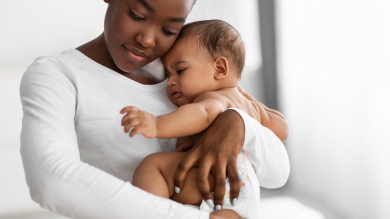 Mom with upset baby