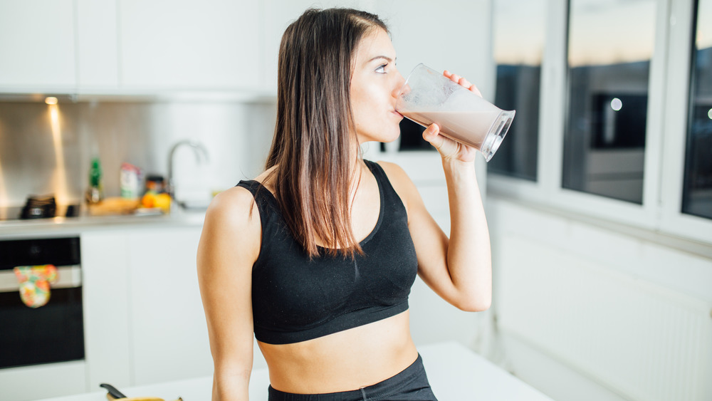 Woman drinking a protein shake