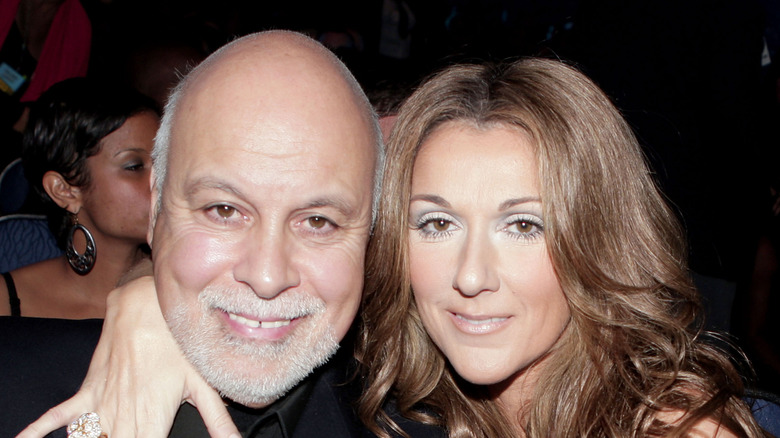 René Angélil and Celine Dion smiling