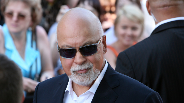 René Angélil wearing sunglasses