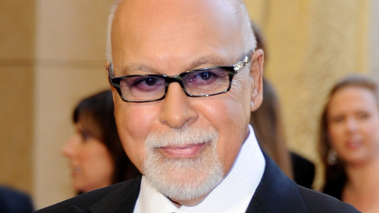 René Angélil smiling