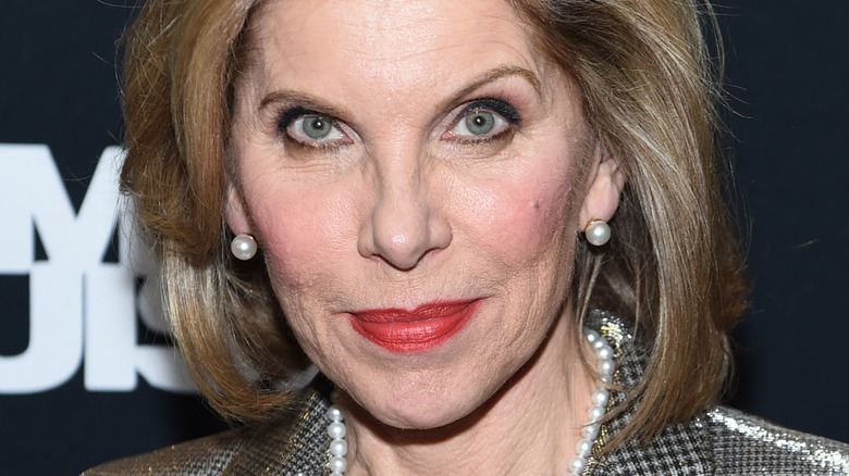 Christine Baranski posing, wearing pearls