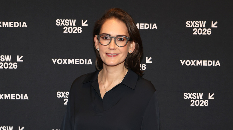 Jessica Tarlov wearing glasses in front of a black background in 2026