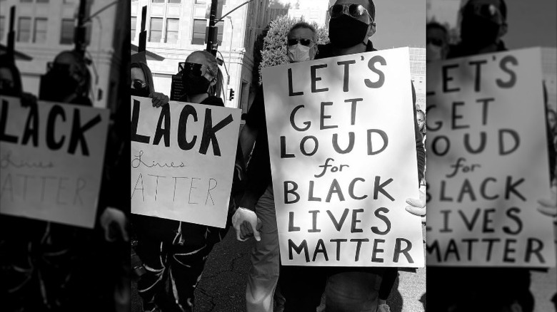 Jennifer Lopez, Alex Rodriguez protesting