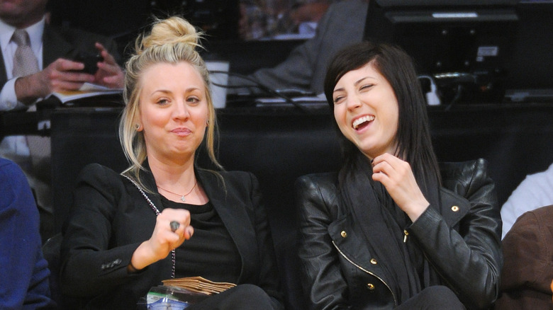 Briana Cuoco (right) and Kaley Cuoco (left) at a Los Angeles Lakers game in 2013