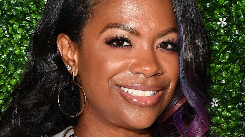 Kandi Burruss smiling