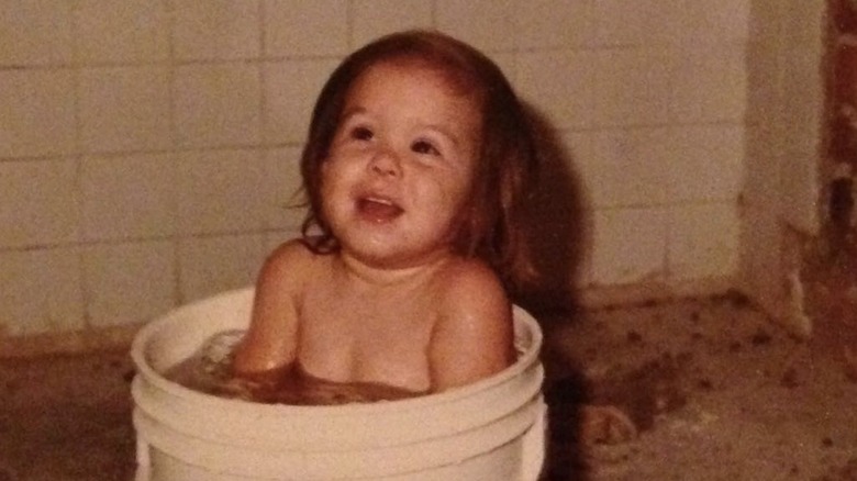 Kat Von D in a bucket as a baby