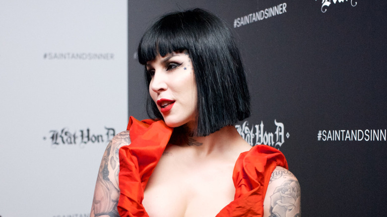 Kat Von D in a red dress