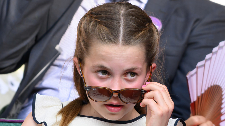 Princess Charlotte attends a match at Wimbledon