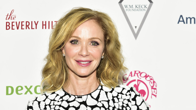 Lauren Holly smiling