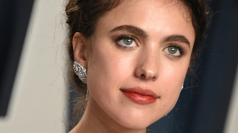 Margaret Qualley with an updo'