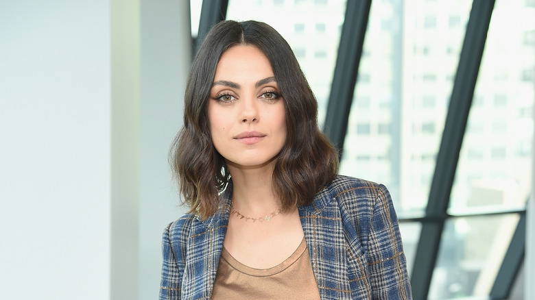 Mila Kunis in a blazer