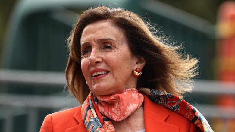 Nancy Pelosi wearing scarf