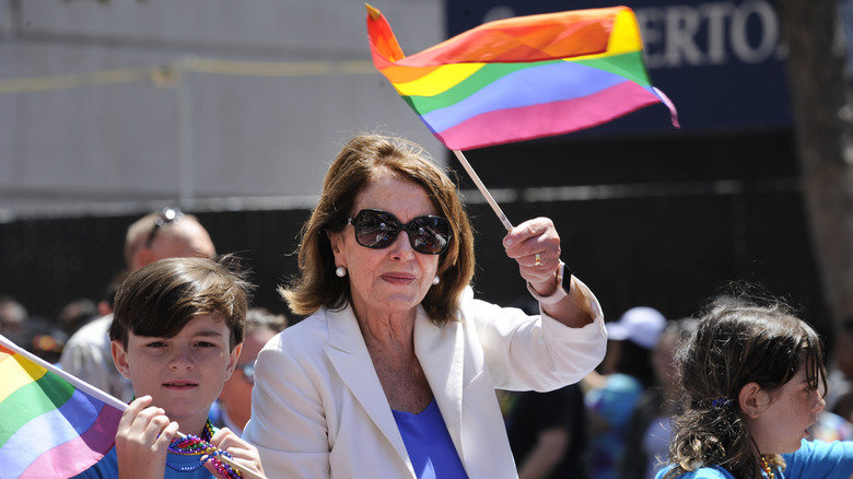 Nancy Pelosi waving flag