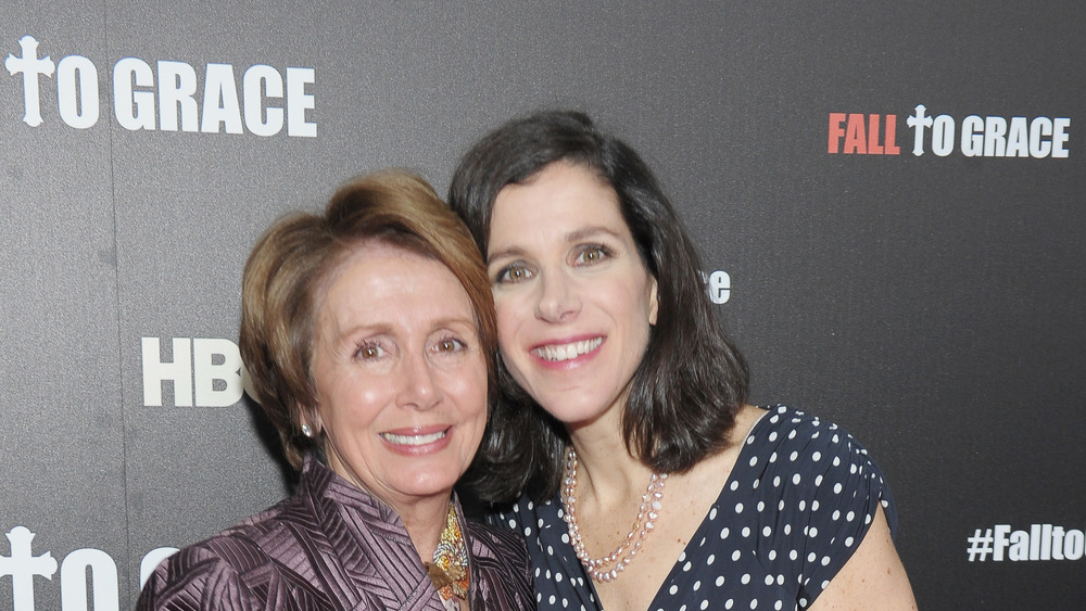 Nancy Pelosi smiling with Alexandra