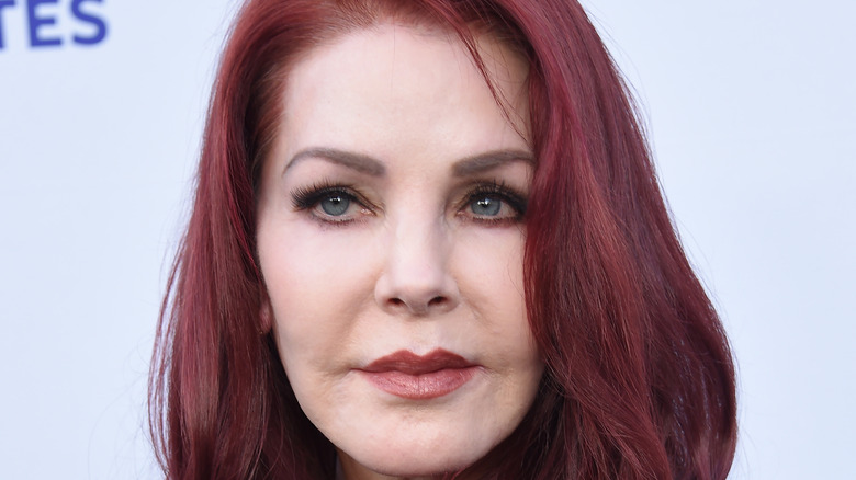 Priscilla Presley with red hair
