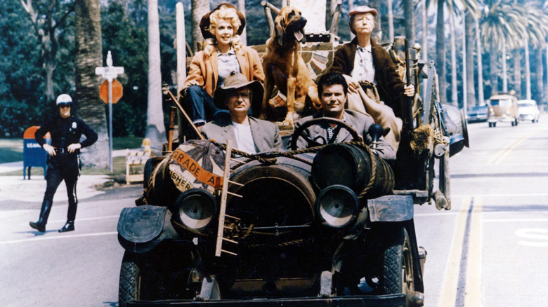 Donna Douglas, Irene Ryan, Buddy Ebsen, and Max Baer Jr. in the Beverly Hillbillies' car