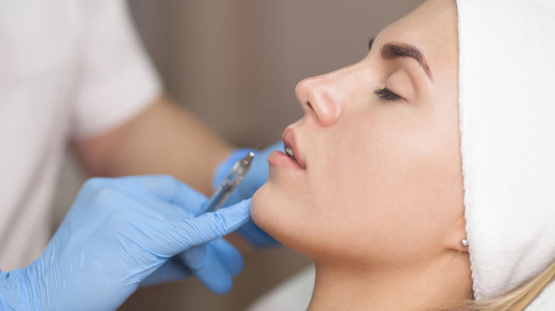 A woman getting dermal fillers
