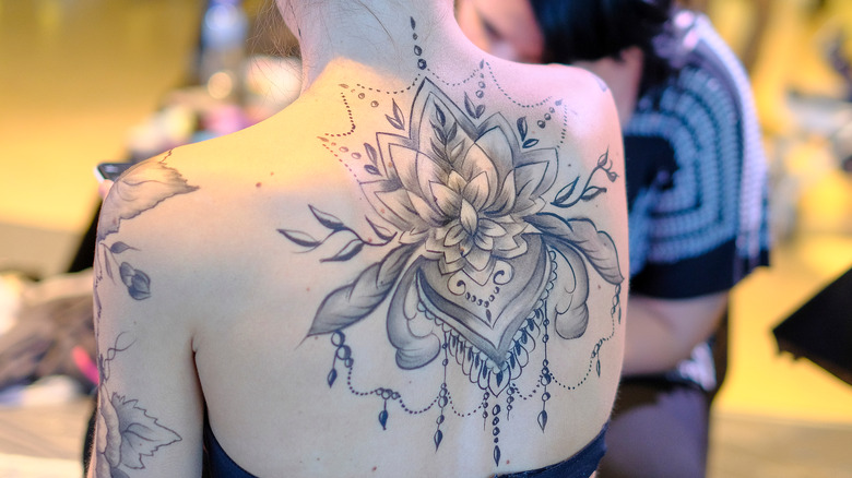 What You Should Know About The Spiritual Tattoo Trend