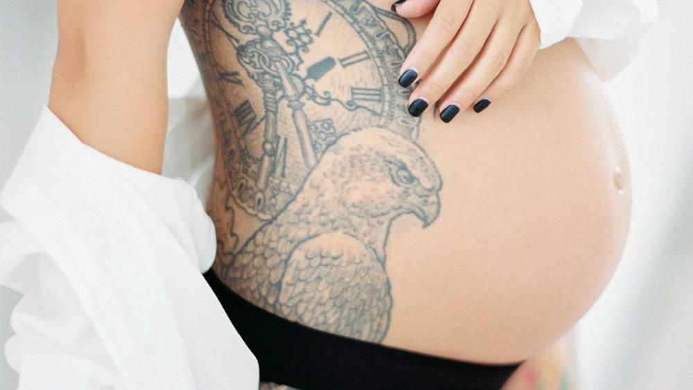 Tattooed pregnant woman