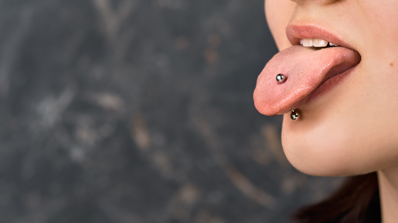 Person with tongue piercing