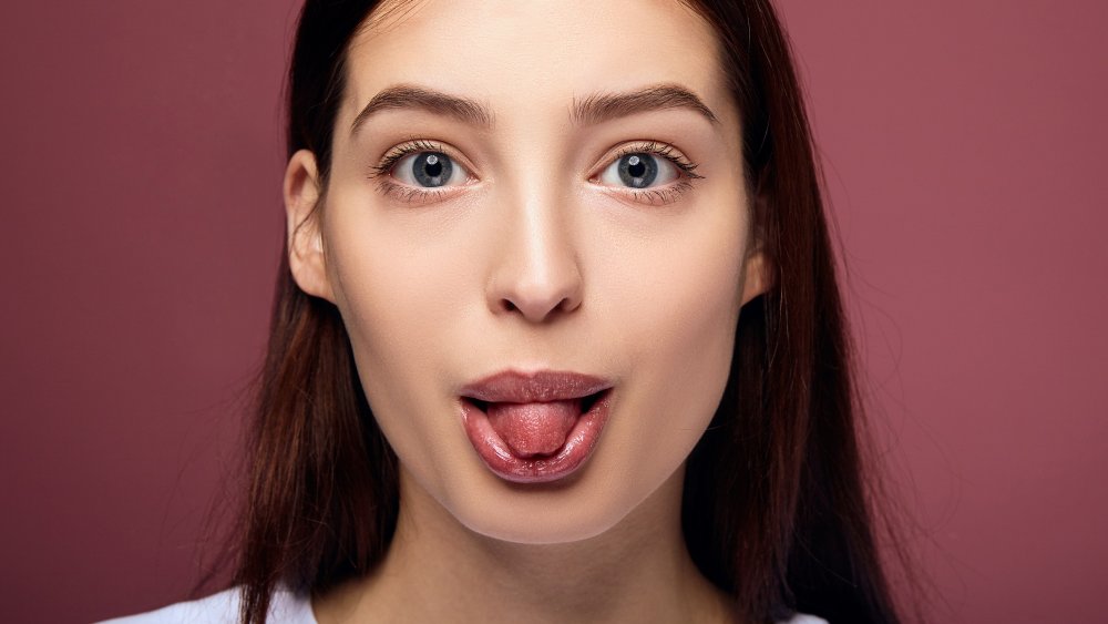 woman sticking tongue out