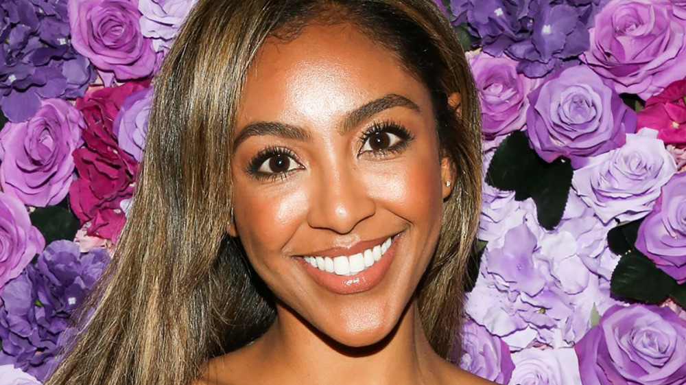 Bachelorette Tayshia Adams smiling