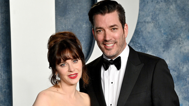 Zooey Deschanel and Jonathan Scott at the 2020 Vanity Fair Oscars Party