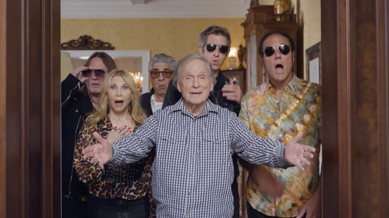 Dick Cavett and friends at the front door of his home