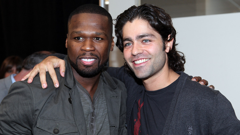 Adrian Grenier and Curtis "50 Cent" Jackson smiling at the 2012 Charity Day