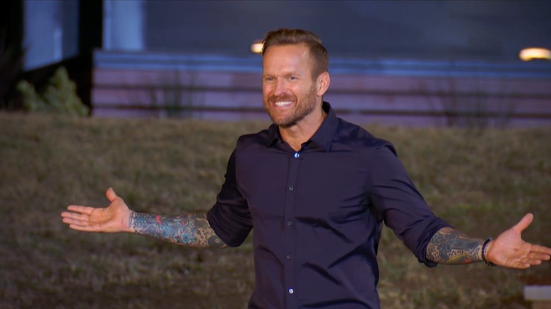 Bob Harper, arms outstretched, welcoming contestants to the Biggest Loser