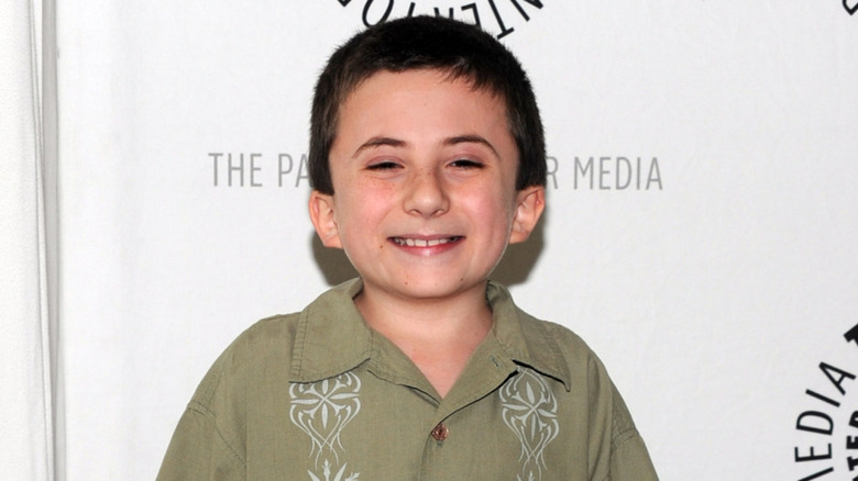 Atticus Shaffer smiling at the Paley Center in 2010.