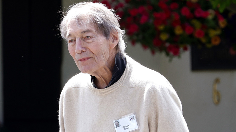 Charlie Rose walking