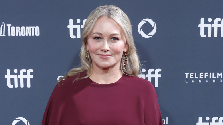 Christine Taylor posing on the TIFF red carpet in Toronto